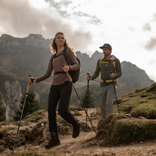 Are trekking poles worth it? two hikers using Leki trekking poles in a mountainous area