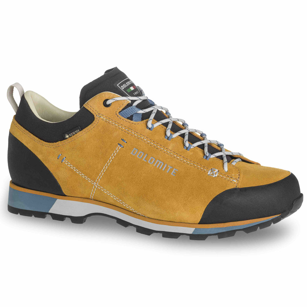 Yellow hiking shoe with black accents on a white background