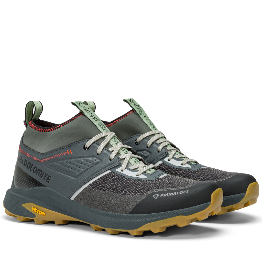 Pair of gray hiking shoes with Primaloft and Dolomite branding on a white background