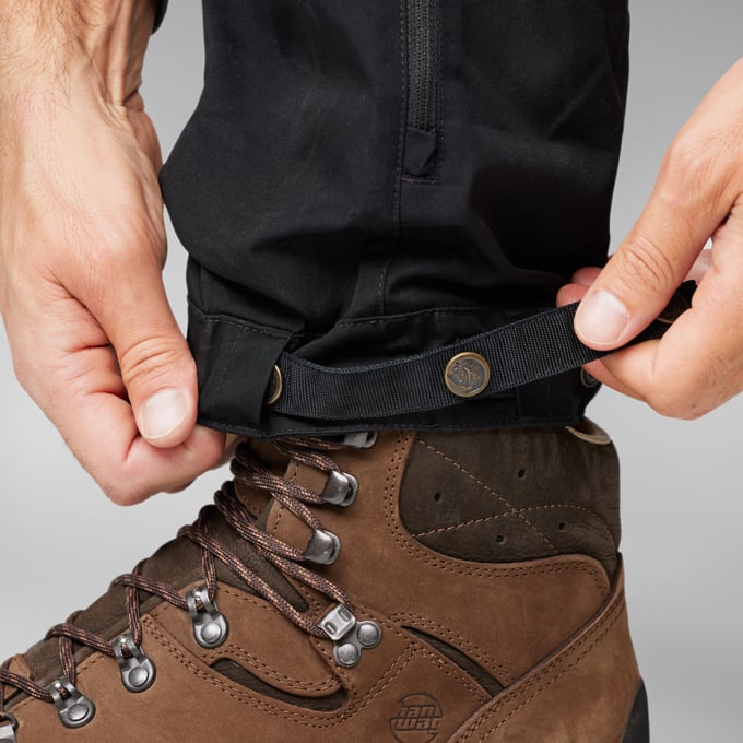 Fjallraven Men's Keb Trousers Model Kneel Close Up Leg Lower Detail Near Shoes