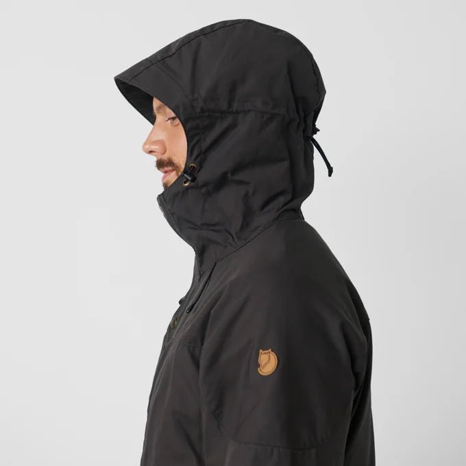 Fjallraven Men's Skogso Jacket Model Side Detail Hood Up and Logo