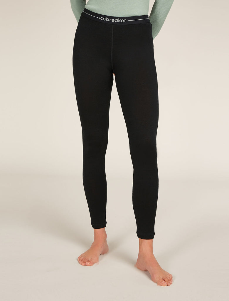 Black leggings with 'icebreaker' branding on a plain background