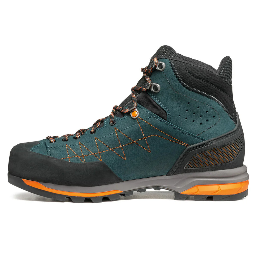 Teal and black hiking boot with orange accents on a white background