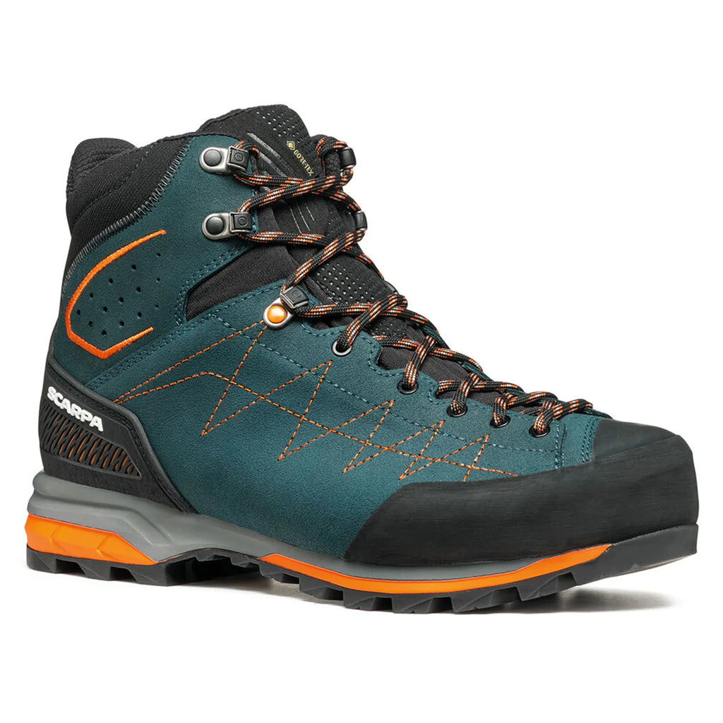 Blue hiking boot with orange accents on a white background