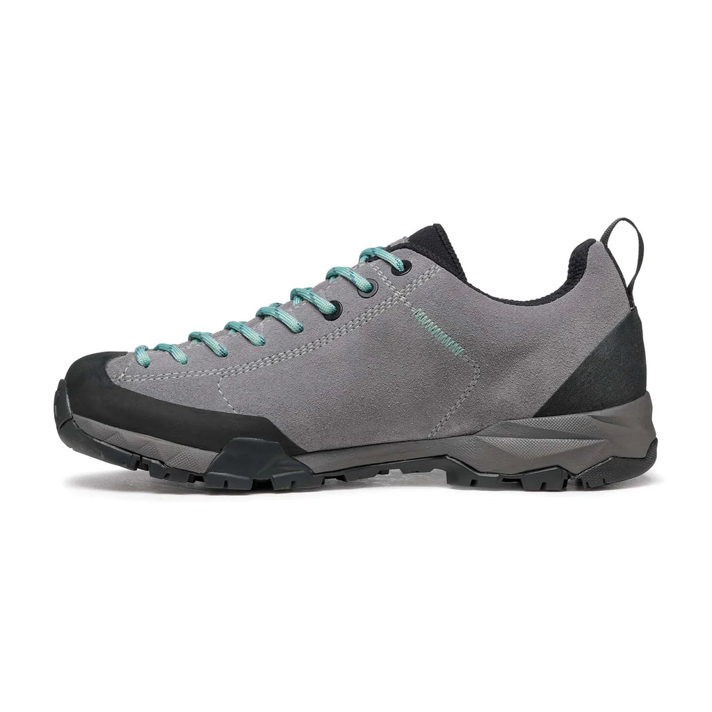Gray hiking shoe with teal laces on a white background