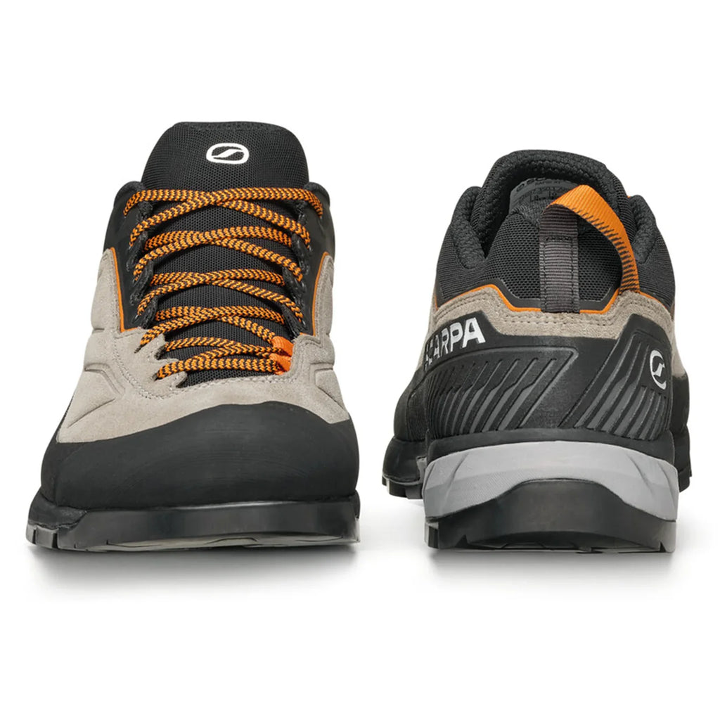 Pair of black, gray, and orange hiking shoes with 'Scarpa' branding on a white background.