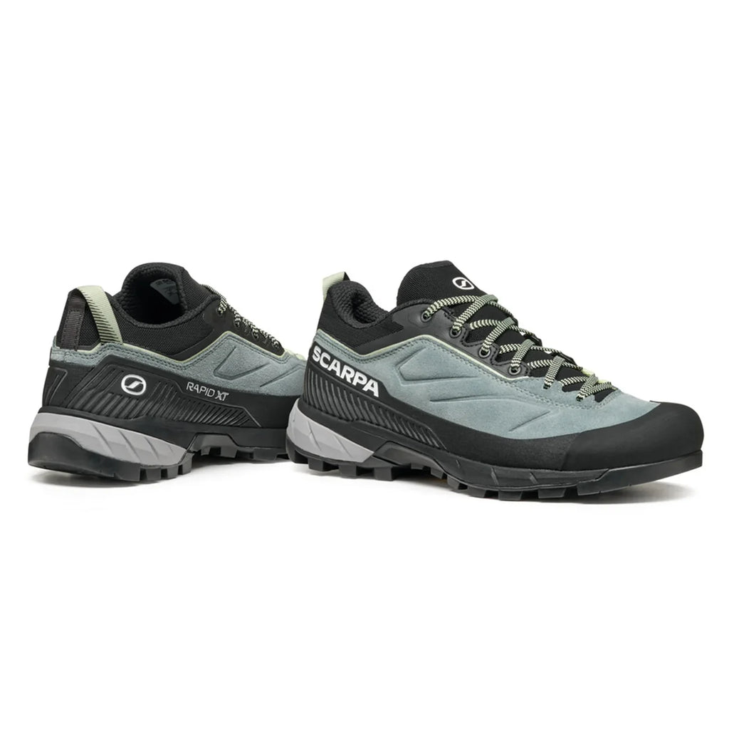Pair of gray and black hiking shoes with 'Scarpa' branding on a white background