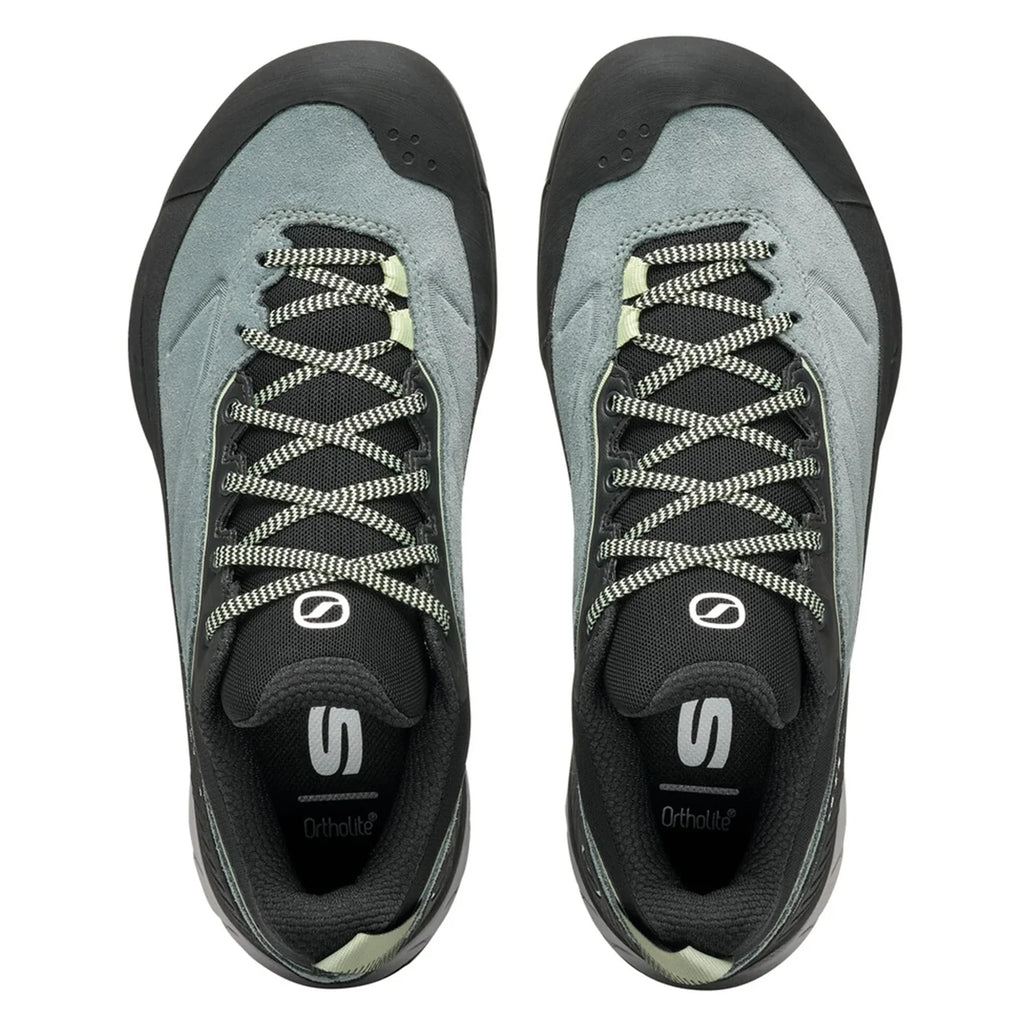 Pair of gray and black climbing shoes on a white background