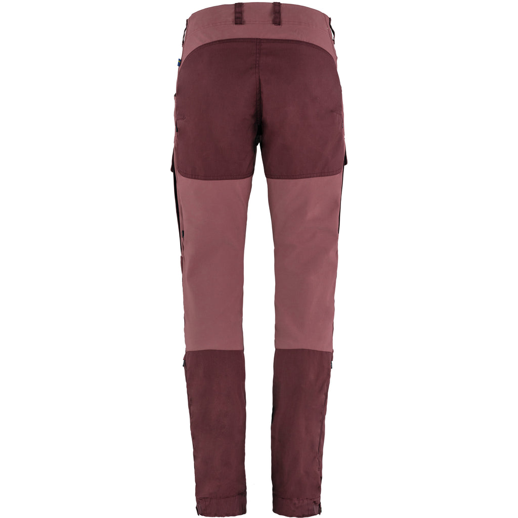 Maroon hiking pants on a white background